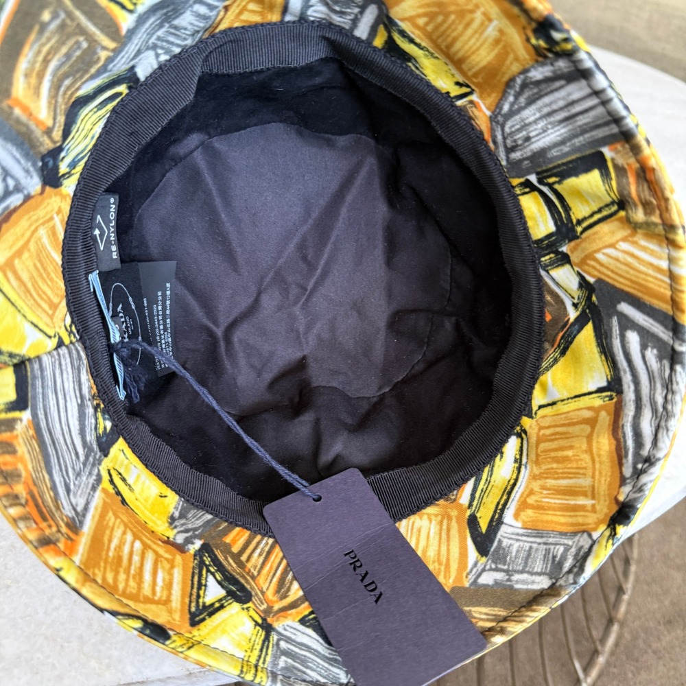 Prada Graphic Print Nylon Bucket Hat Black Gold Triangle Logo 1HC137 Size M - Picture 3 of 12